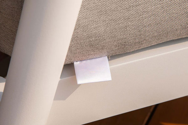 Blank white tag on outdoor furniture