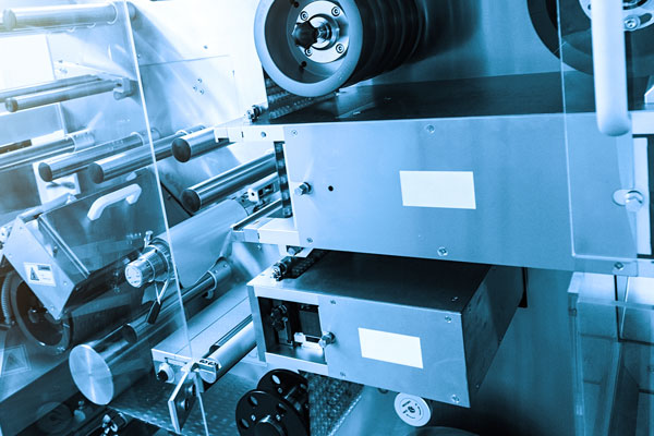 Blank white Industrial labels on automated mechanical equipment